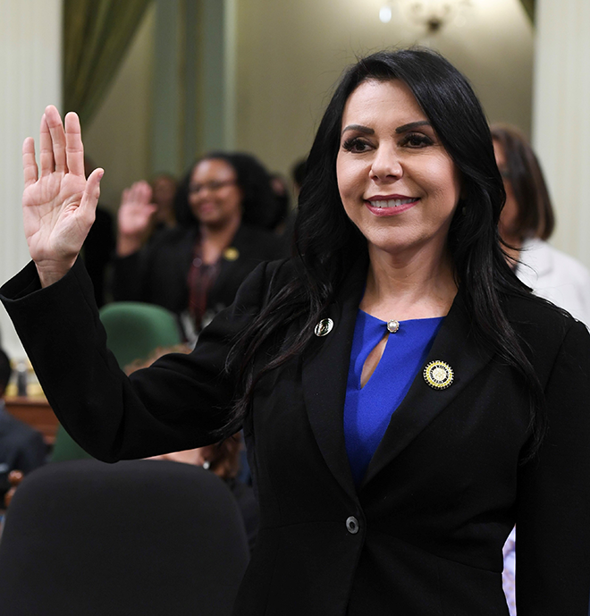 Assemblywoman Blanca E. Rubio holding her right hand up